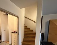 Wohnbereich mit Treppenaufgang