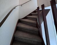 Holzteppe zum Obergeschoss 