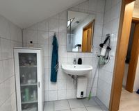 Badezimmer im Dachgeschoss 