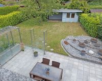 Blick in den Garten aus dem DG