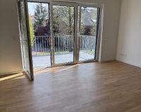 Wohnzimmer mit Echtholzparkettboden 