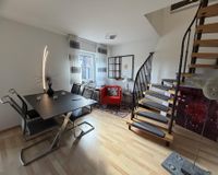 Essbereich mit Treppe zum Dachgeschoss 