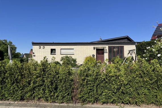 Sanierungsbedürftiger Bungalow in ruhiger Sackgasse von Büderich